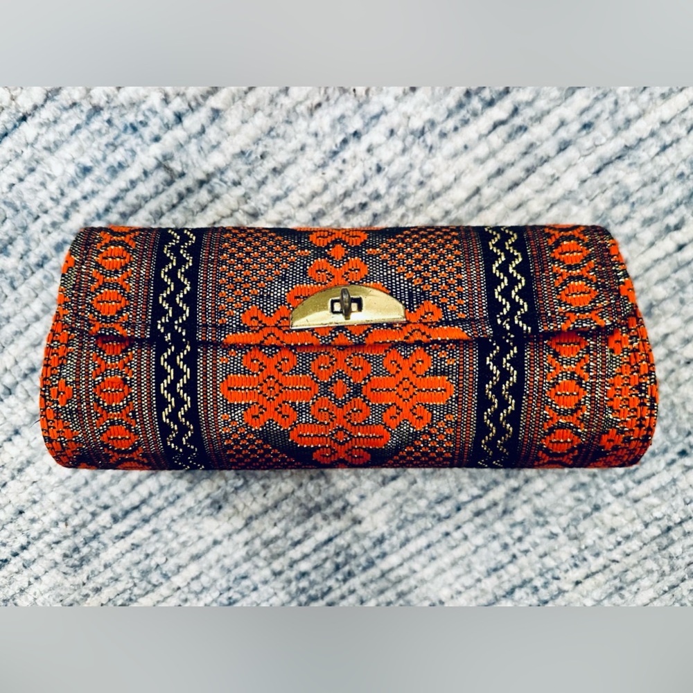 Vintage Orange Black Gold Handheld Clutch with gold-toned metal closure